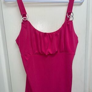 Torrid Fuchsia Sleeveless Top the shirt says it is a 3X but I believe it’s a XL